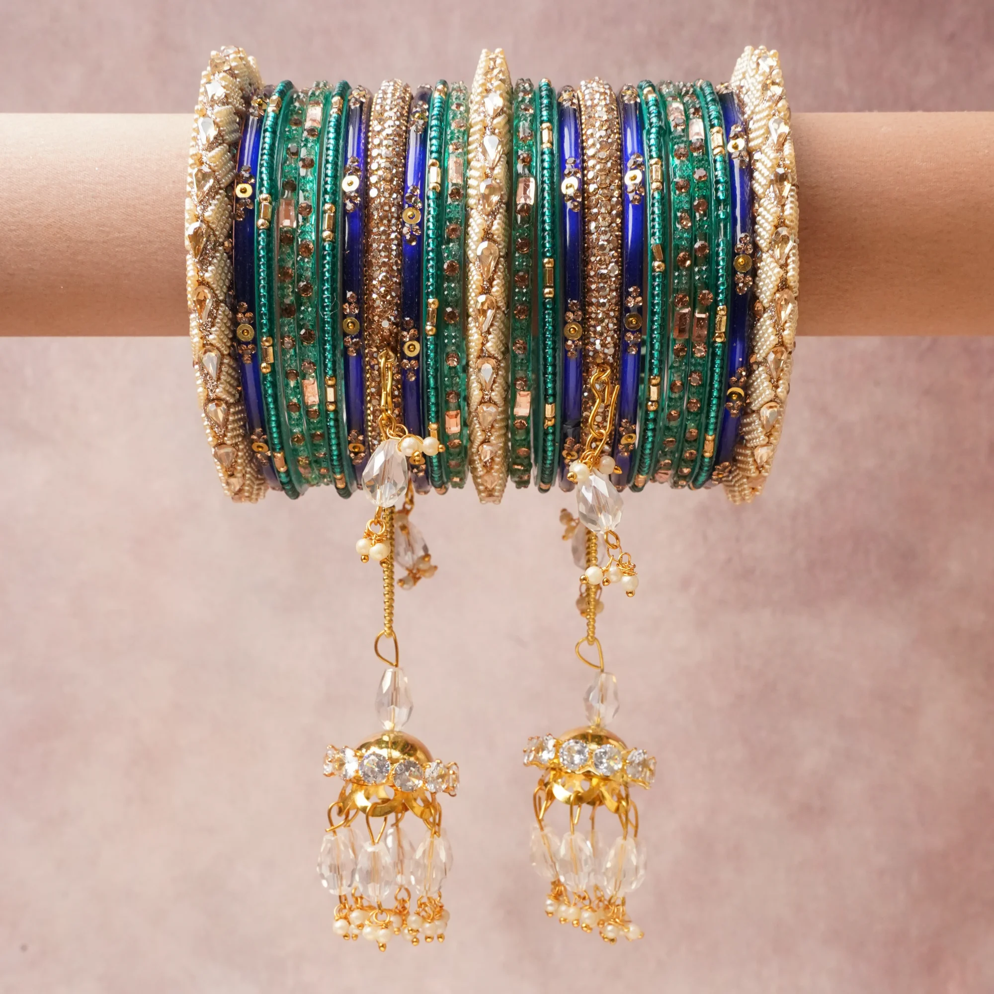 A commanding Deep Sapphire Blue anchors this beautiful set, enriched with accents of Cream White, Clear Crystal, Bright Gold, Rose Gold that add depth and dimension.

Featuring a striking composition of Glass, Gold-toned Metal, Faux Pearls, Rhinestones, this set carries intricate craftsmanship and strong presence. Grand in form, it is created for moments that deserve to be marked.